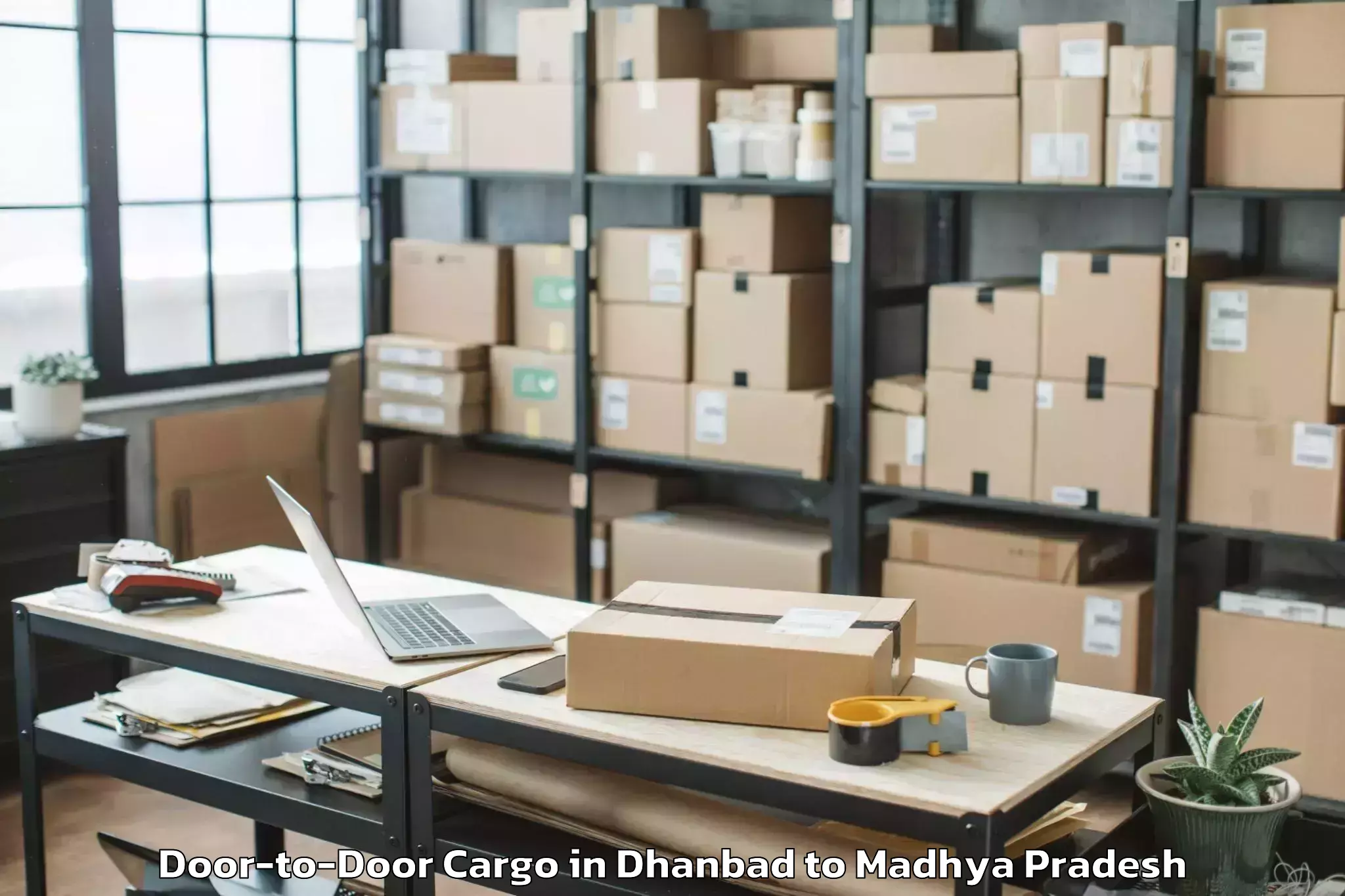 Book Dhanbad to Kurwai Door To Door Cargo Online